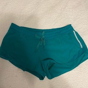 Lululemon teal gotta hot shorts, size 4